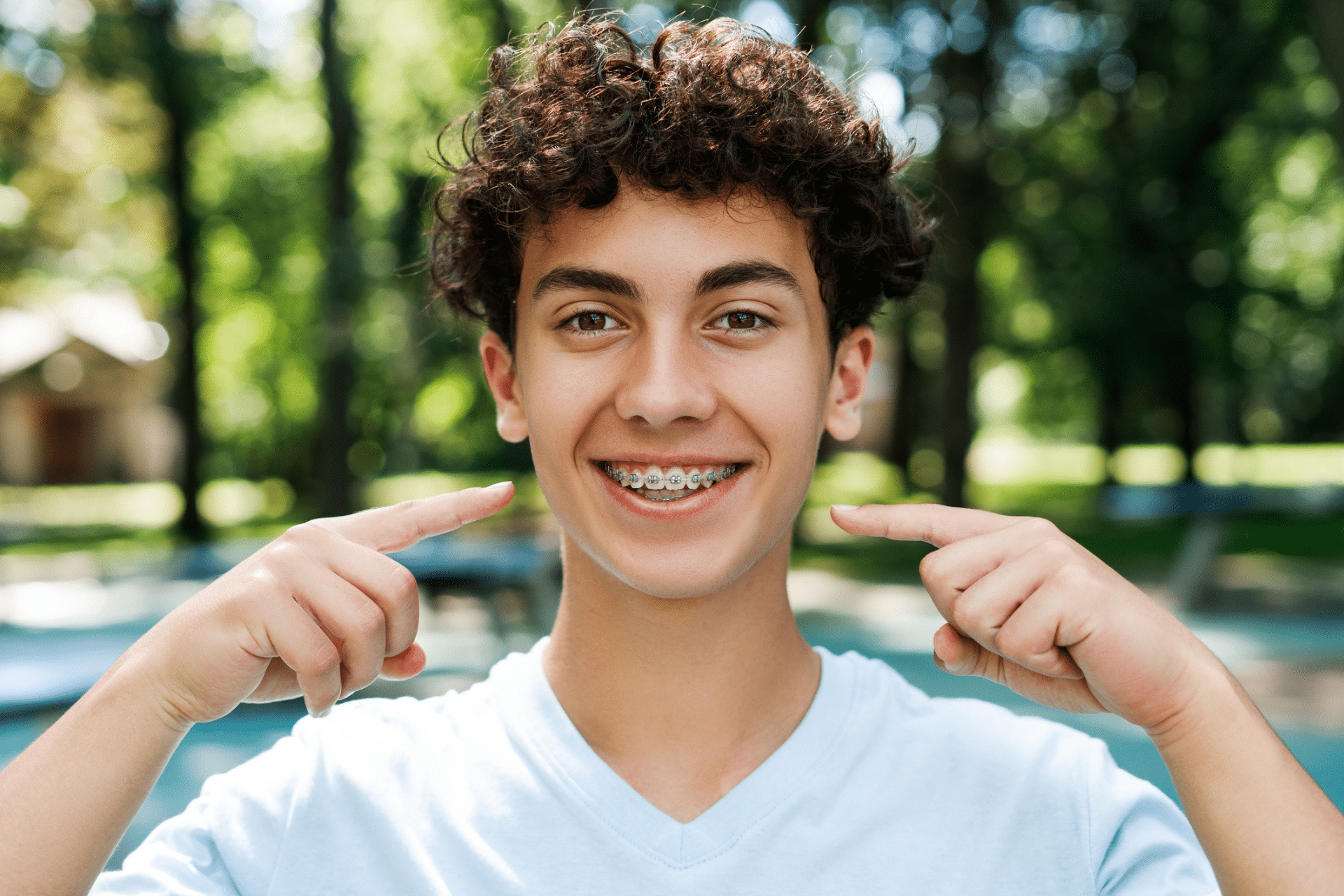 Teen smiling with braces in McAllen, TX